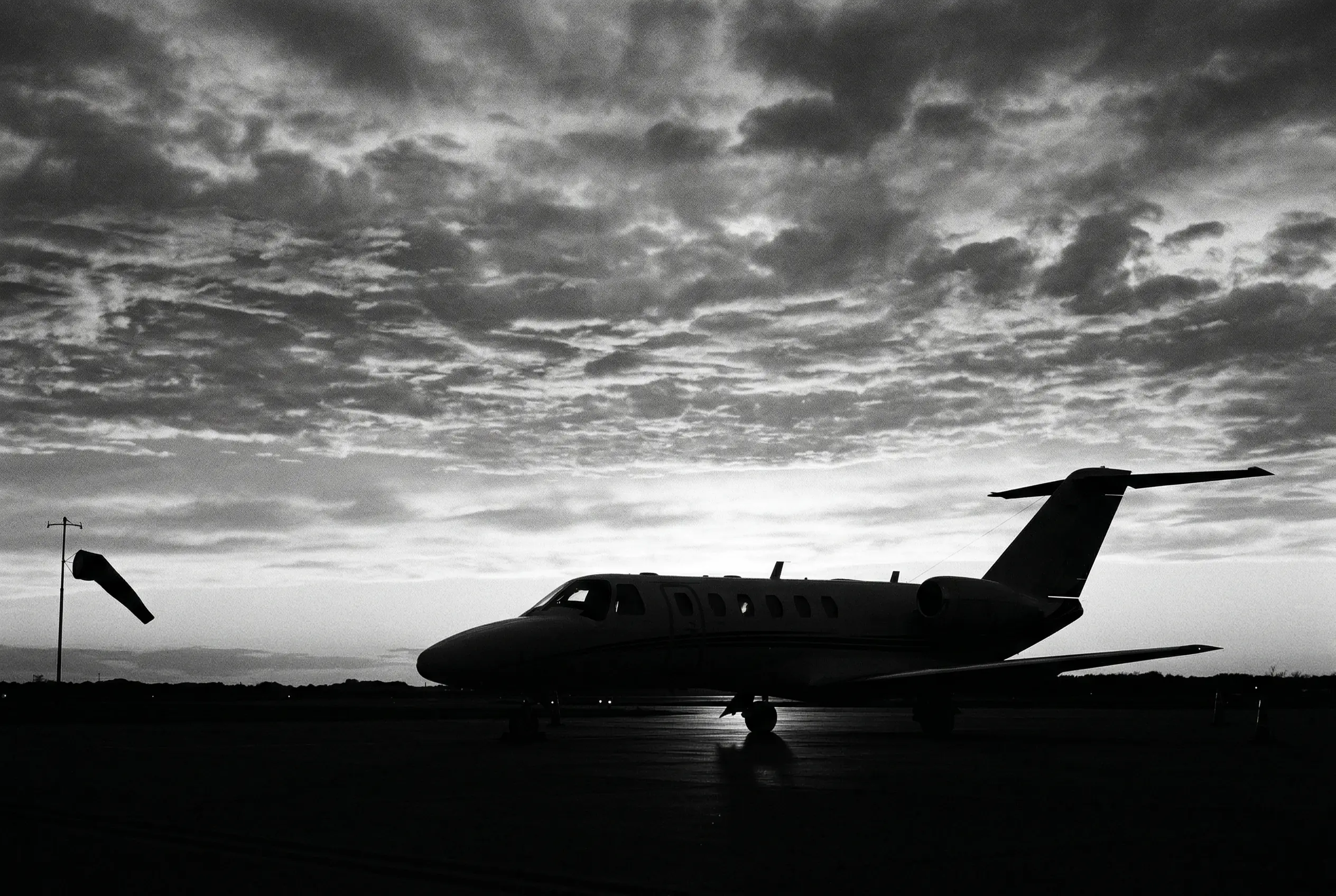 Citation CJ3+ in flight at golden hour with Williams FJ44-3A engines visible